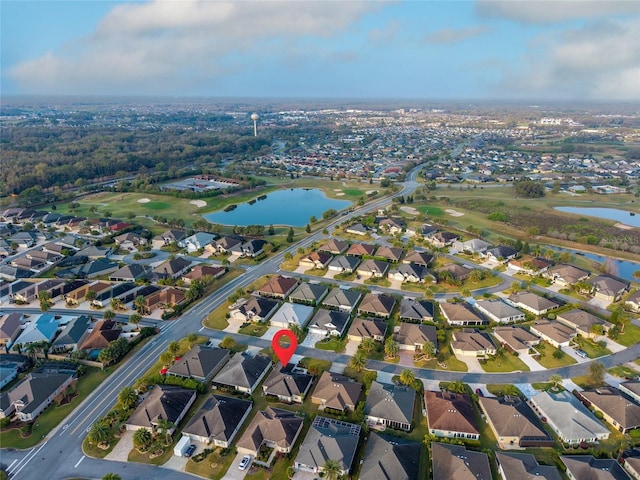 aerial view with a residential view and a water view