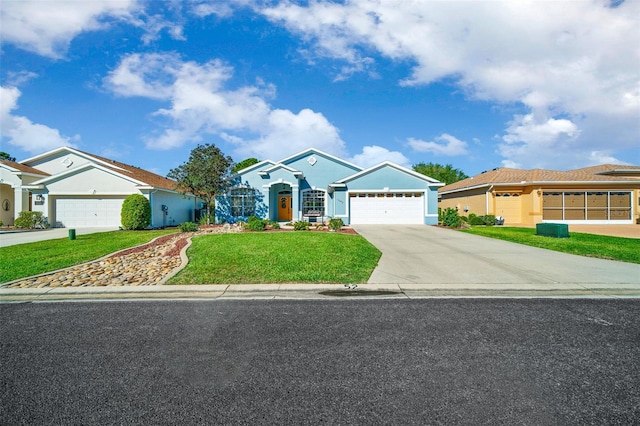 view of front of property with a front lawn, concrete driveway, a garage, and stucco siding