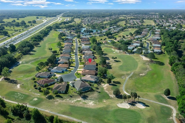 bird's eye view with a residential view and view of golf course