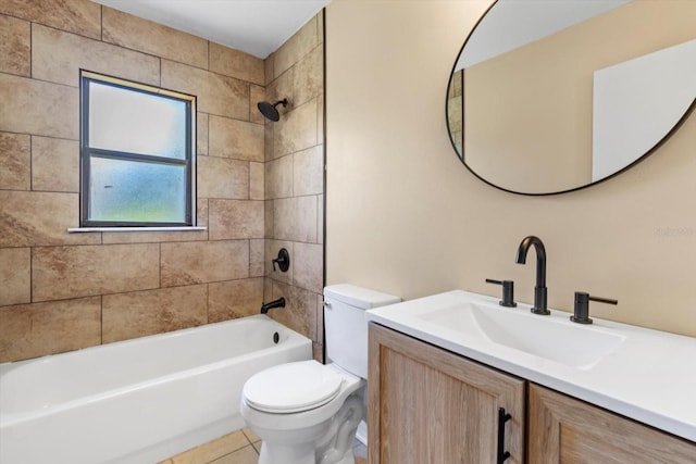 full bathroom featuring vanity, tile patterned floors, toilet, and shower / washtub combination