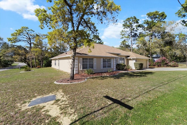 ranch-style house featuring a front yard, an attached garage, driveway, and stucco siding