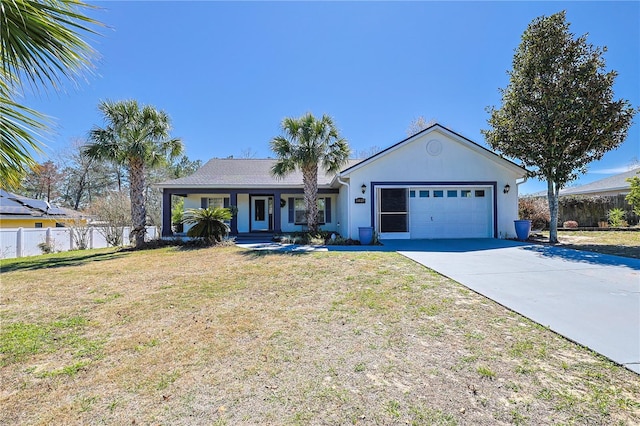 single story home with a front lawn, fence, stucco siding, a garage, and driveway