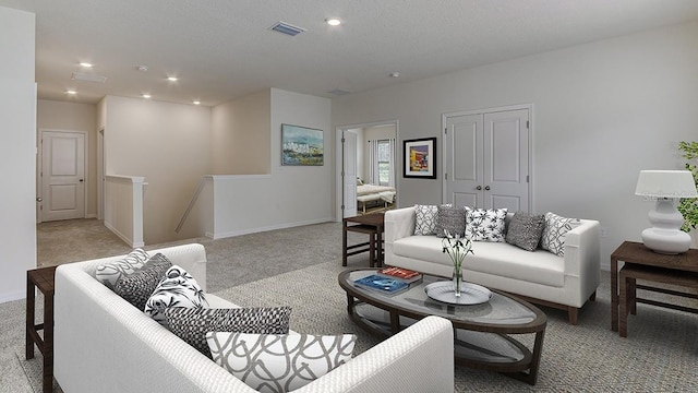 living room featuring recessed lighting, visible vents, light carpet, and baseboards