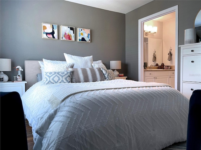 bedroom featuring connected bathroom