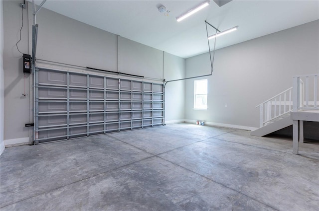 garage featuring baseboards