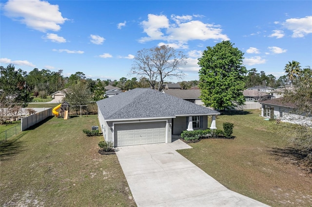 single story home with a front lawn, a playground, concrete driveway, and a garage