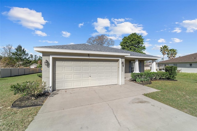 single story home featuring a front yard, concrete driveway, and stucco siding