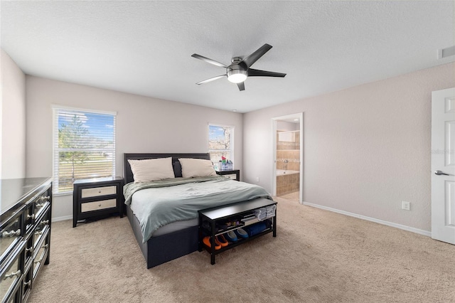 bedroom featuring baseboards, multiple windows, and light colored carpet