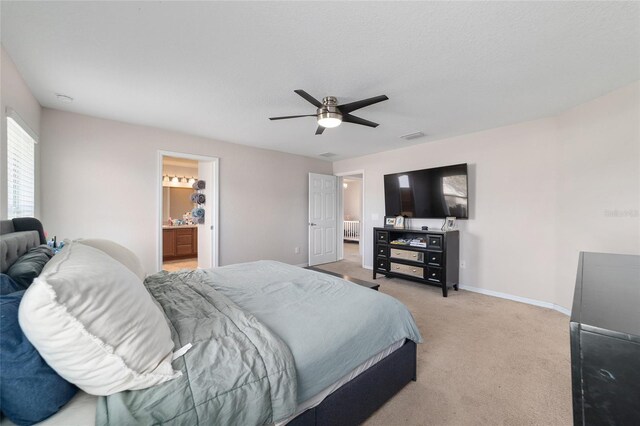 bedroom featuring visible vents, radiator, baseboards, ceiling fan, and light colored carpet