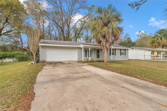 single story home with driveway, an attached garage, a front lawn, and fence