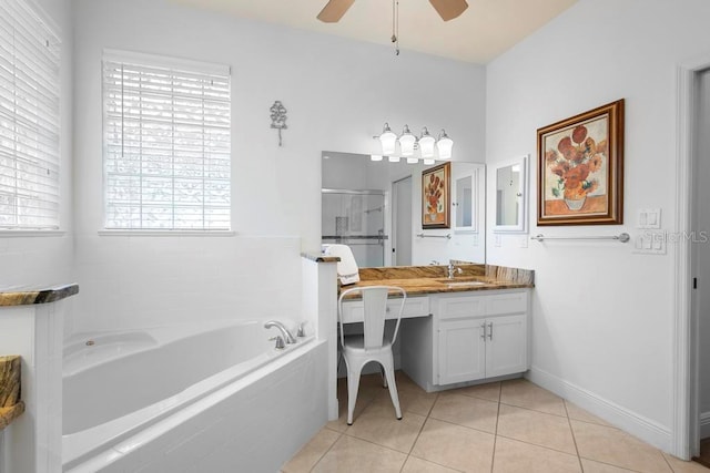 full bathroom with tile patterned floors, a garden tub, a stall shower, ceiling fan, and vanity