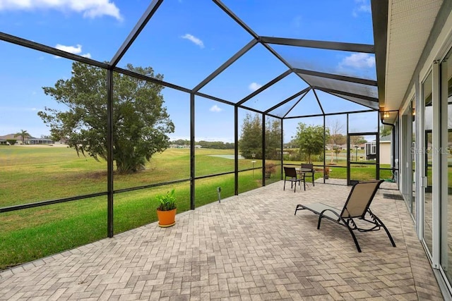 view of patio with a lanai