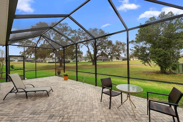 view of patio with a lanai