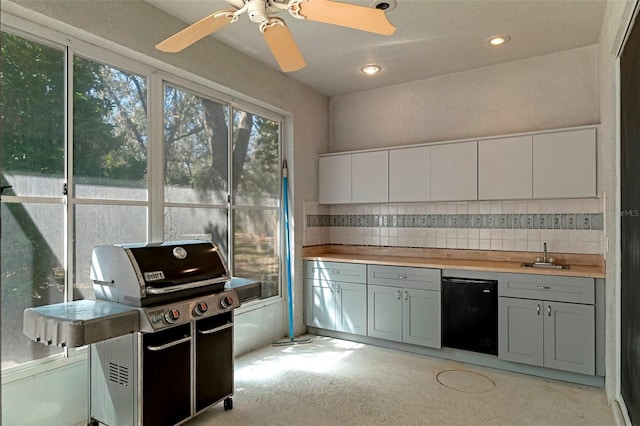 kitchen with gray cabinets, recessed lighting, white cabinets, light countertops, and decorative backsplash