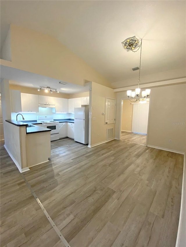 kitchen with visible vents, white appliances, white cabinetry, and light wood-type flooring