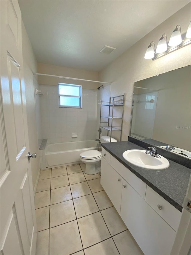 full bath featuring vanity, visible vents,  shower combination, tile patterned floors, and toilet