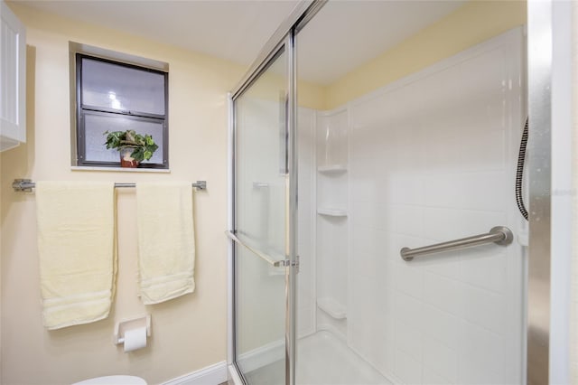 bathroom featuring a stall shower