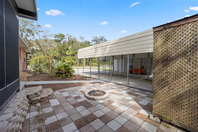 view of patio featuring a fire pit