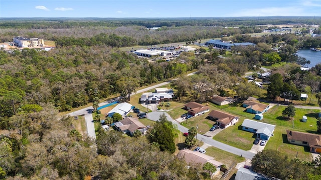 bird's eye view featuring a wooded view