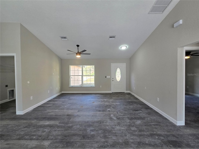 unfurnished living room featuring visible vents and lofted ceiling