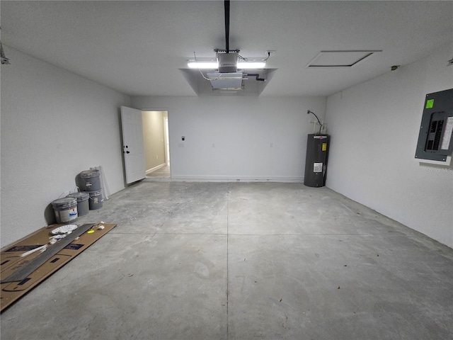 garage featuring electric panel and electric water heater