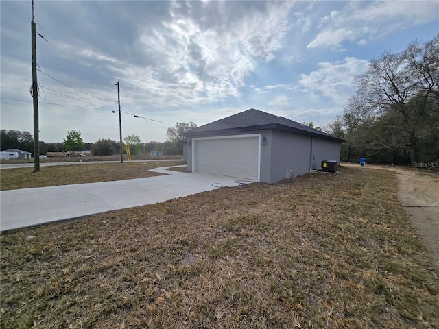 garage featuring driveway