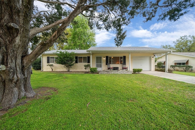 ranch-style home featuring a garage, concrete driveway, and a front lawn