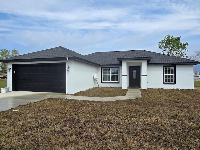 ranch-style house with a shingled roof, a front lawn, concrete driveway, stucco siding, and an attached garage