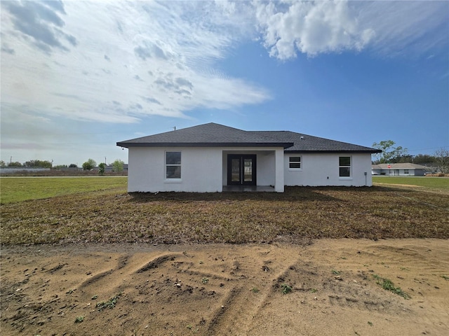 view of front of property featuring stucco siding