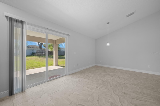 empty room featuring baseboards and marble finish floor