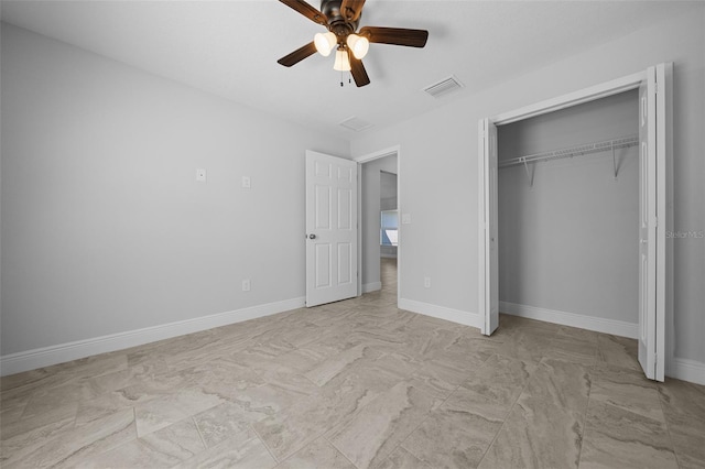 unfurnished bedroom featuring a closet, visible vents, ceiling fan, and baseboards