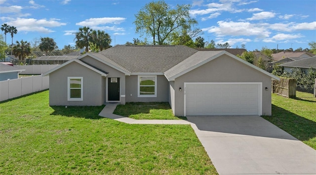 ranch-style home with a front yard, fence, stucco siding, concrete driveway, and a garage