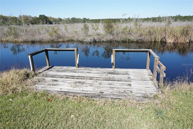 view of dock with a water view