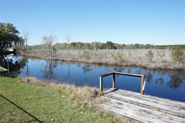 view of dock with a water view