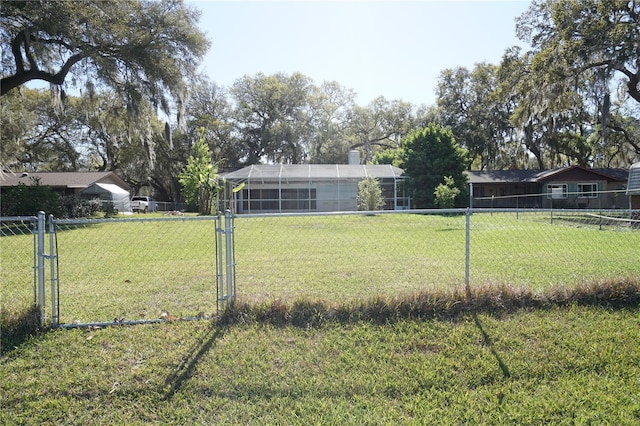 view of yard featuring a gate and fence