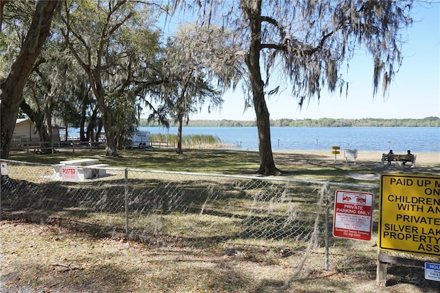 view of water feature with fence