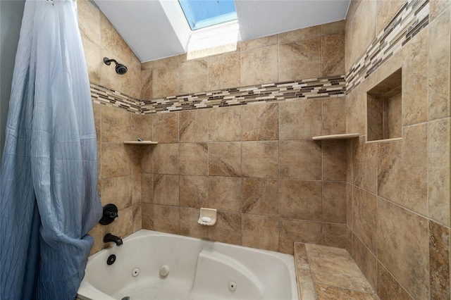 full bathroom with a skylight and a combined bath / shower with jetted tub