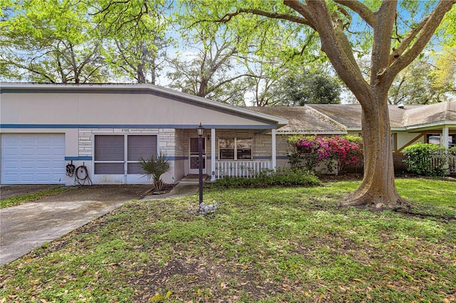 view of front of house featuring an attached garage, a porch, concrete driveway, and a front lawn