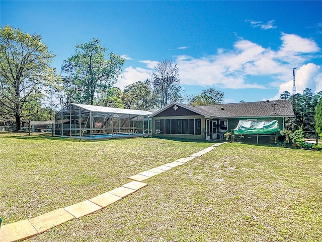 view of yard with a lanai