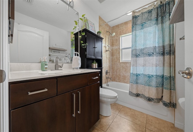 full bath with vanity, tile patterned floors, shower / tub combo, and toilet