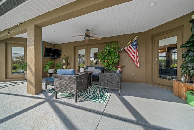 view of patio with french doors, an outdoor hangout area, and ceiling fan