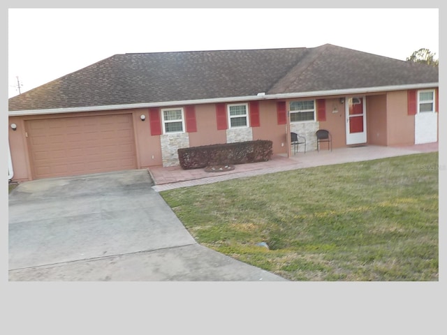 ranch-style home with stucco siding, a front lawn, driveway, roof with shingles, and an attached garage