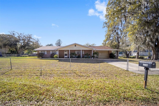 single story home with brick siding, a front lawn, a fenced front yard, a carport, and driveway