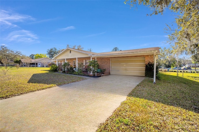 view of front of property with driveway, covered porch, an attached garage, a front yard, and brick siding