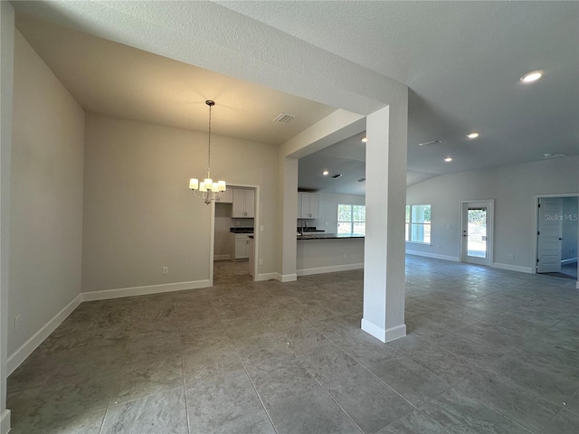 unfurnished dining area featuring recessed lighting, visible vents, baseboards, and a chandelier