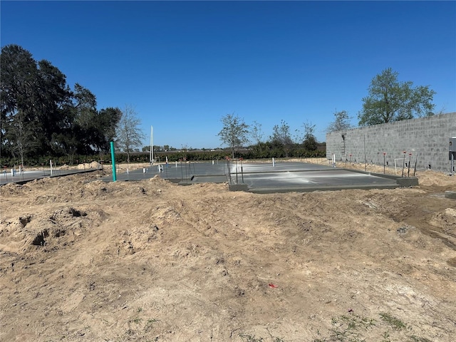 view of home's community with fence