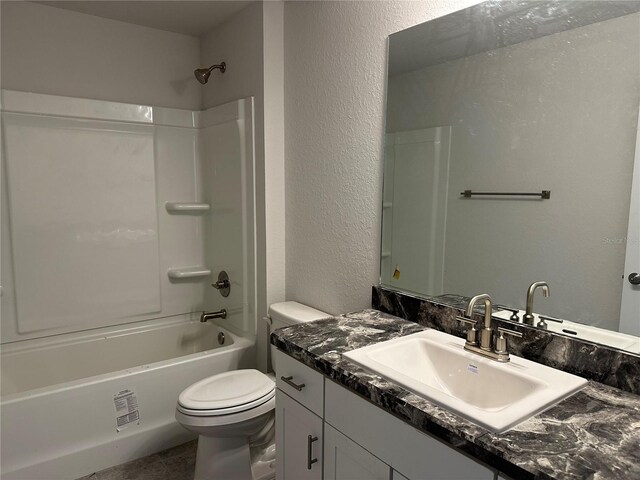 4397 SW 90th Pl, Ocala, FL 34476 - full bath with a textured wall, toilet, vanity, and bathing tub / shower combination