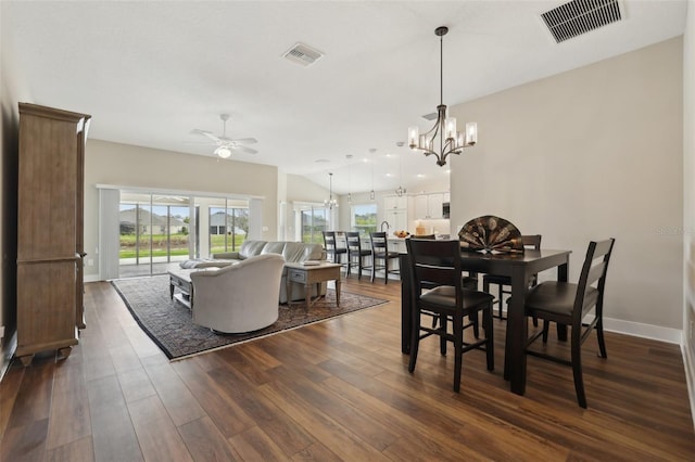 dining area with visible vents, baseboards, and dark wood-style flooring