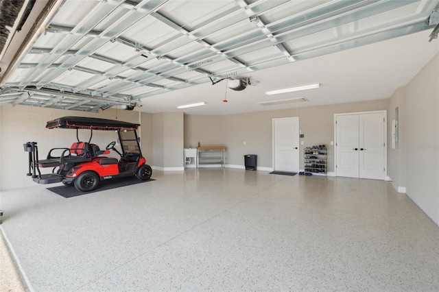 garage featuring a garage door opener