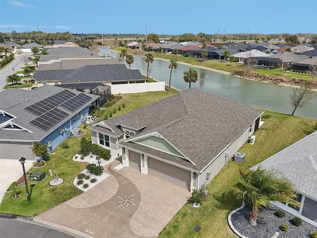 aerial view with a residential view and a water view